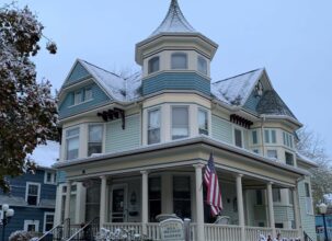 The Franklin Street Inn, a beautifuly Queen Anne Victorian home, covered by a light snowfall