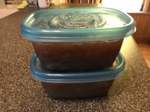 Place selected amount of applesauce into freezer containers.